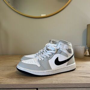 Grey and white Jordan 1s